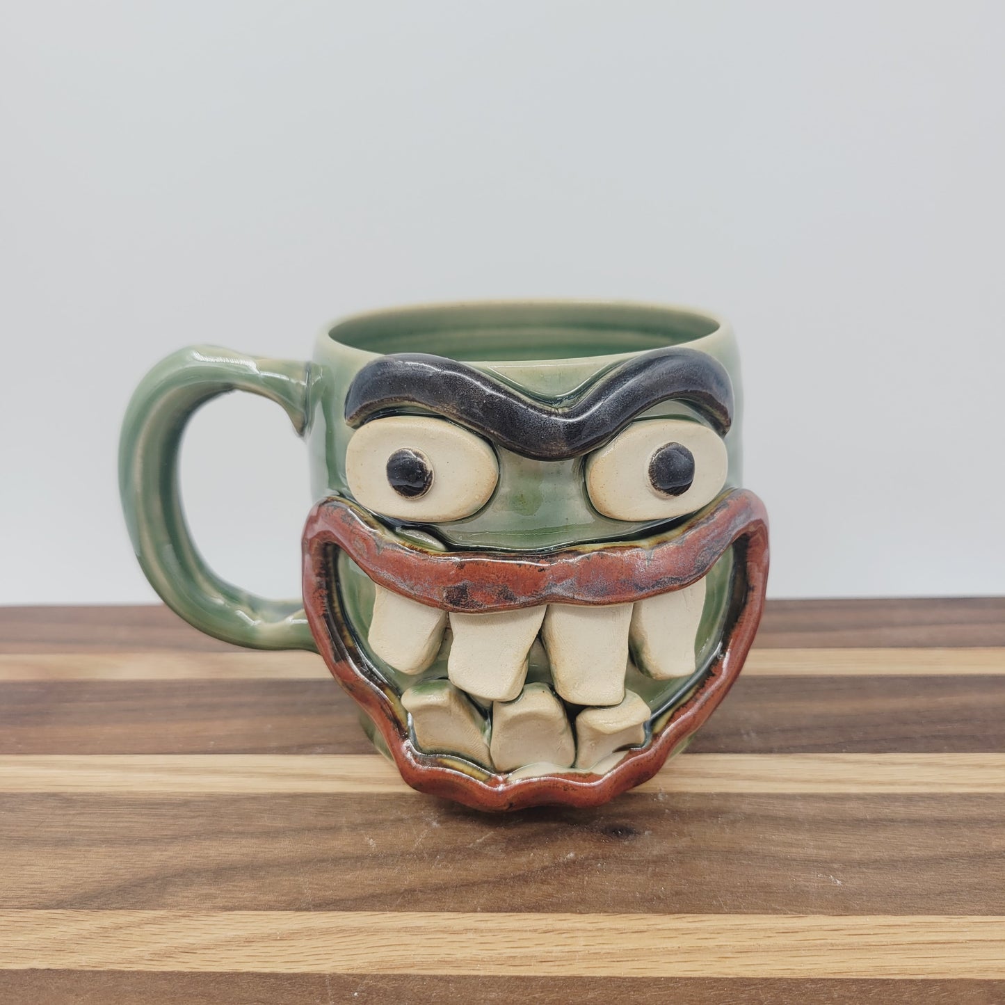 Funny Smiley Face Mug | Green Coffee Cups | Unibrow | Cheesecake Lover